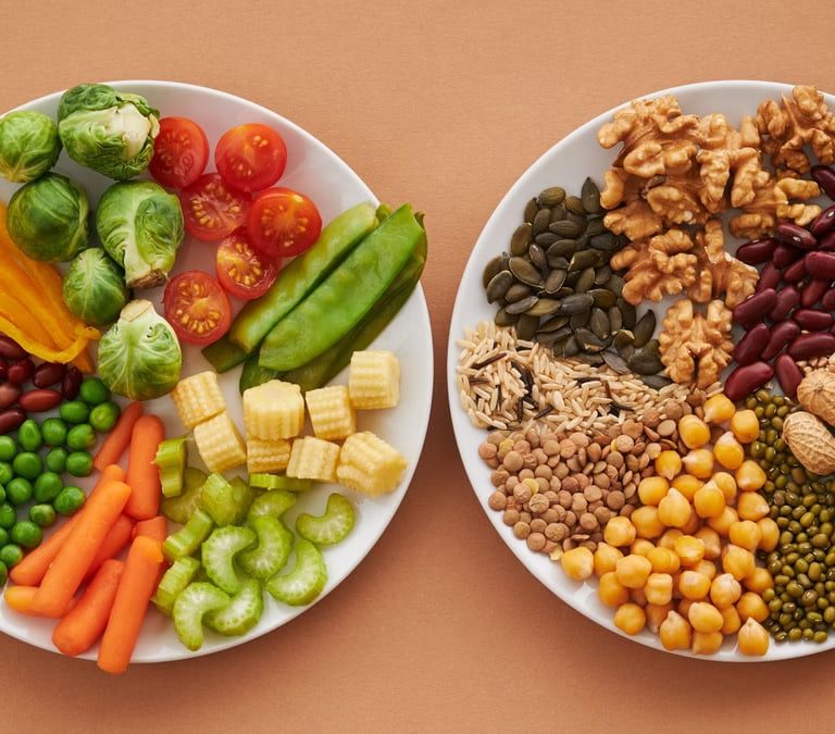 A vibrant flatlay of colorful vegetables and nuts showcasing a balanced diet concept.